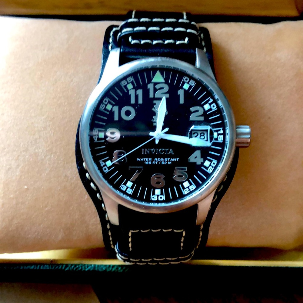 Men’s watch black leather band w white stitching
